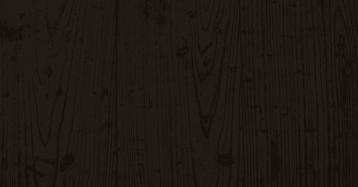 Dark wooden planks with visible grain patterns and knots, conveying a rustic and natural feel. The texture adds depth and warmth to the image.