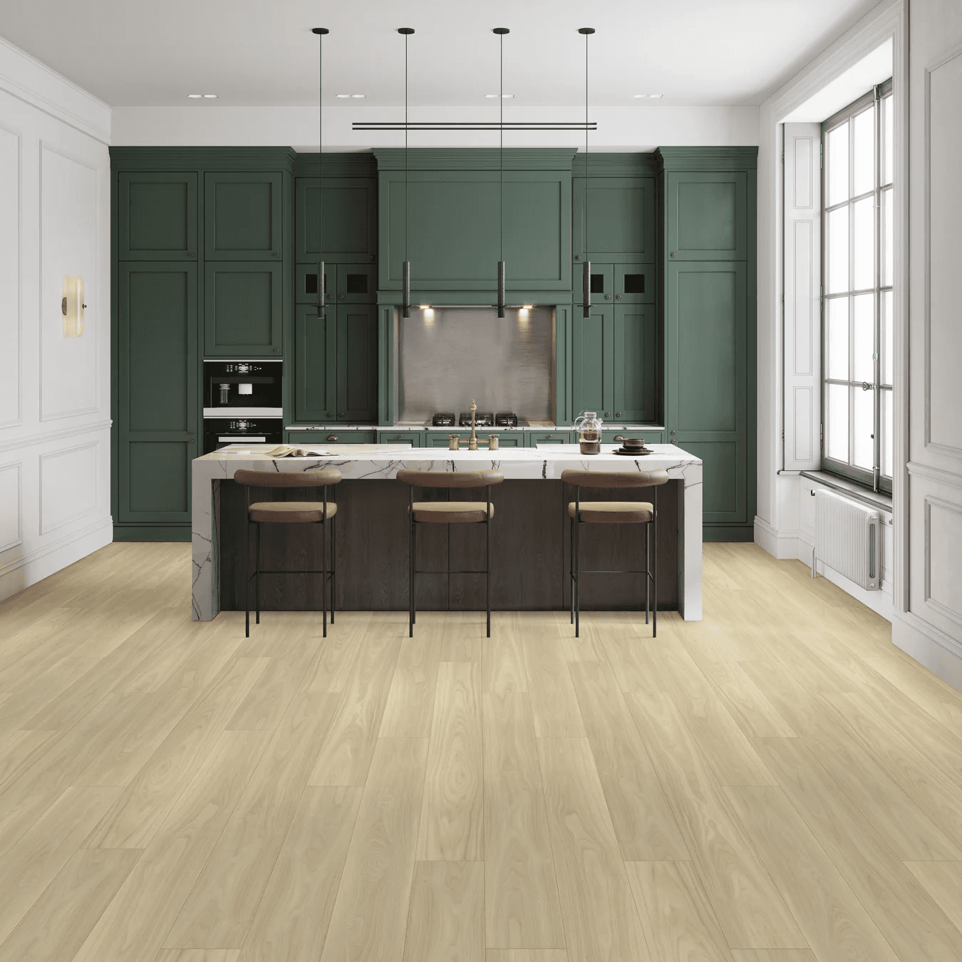 Modern kitchen with dark green cabinets, a large central island with marble countertop, and three brown stools. Light wood flooring and a large window.